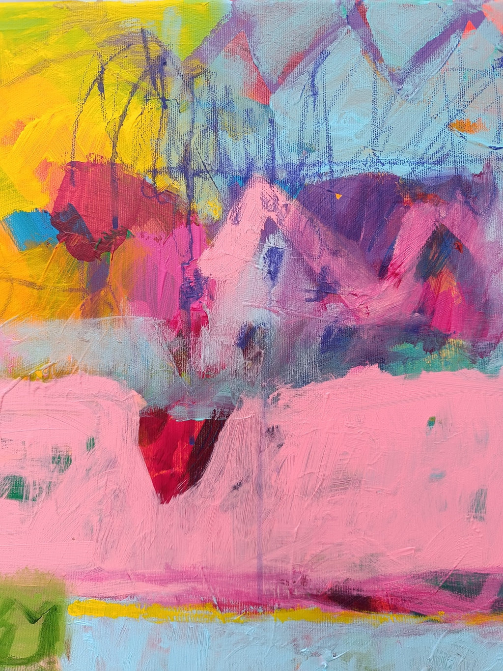 Close-up of bold brush strokes in modern abstract painting with pink, blue and yellow tones