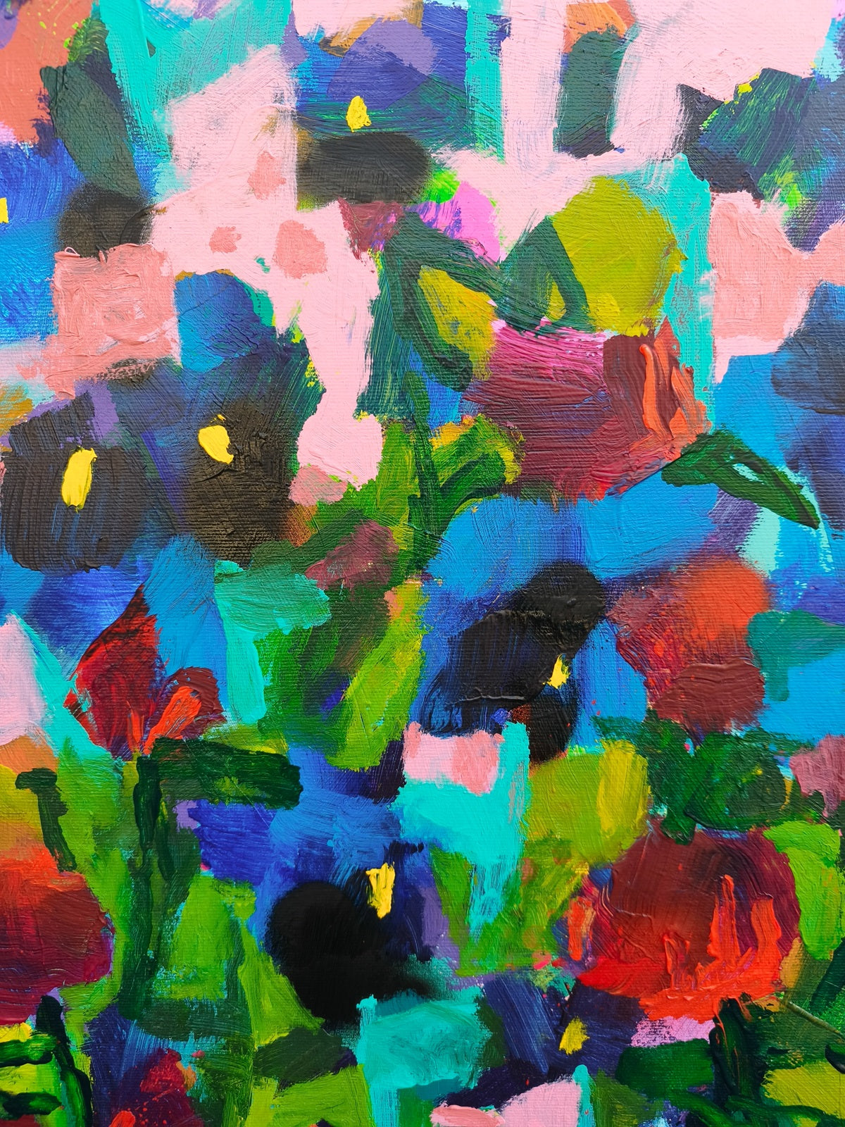 Close-up of abstract floral wall art with expressive brushstrokes in blue and pink tones, modern canvas painting