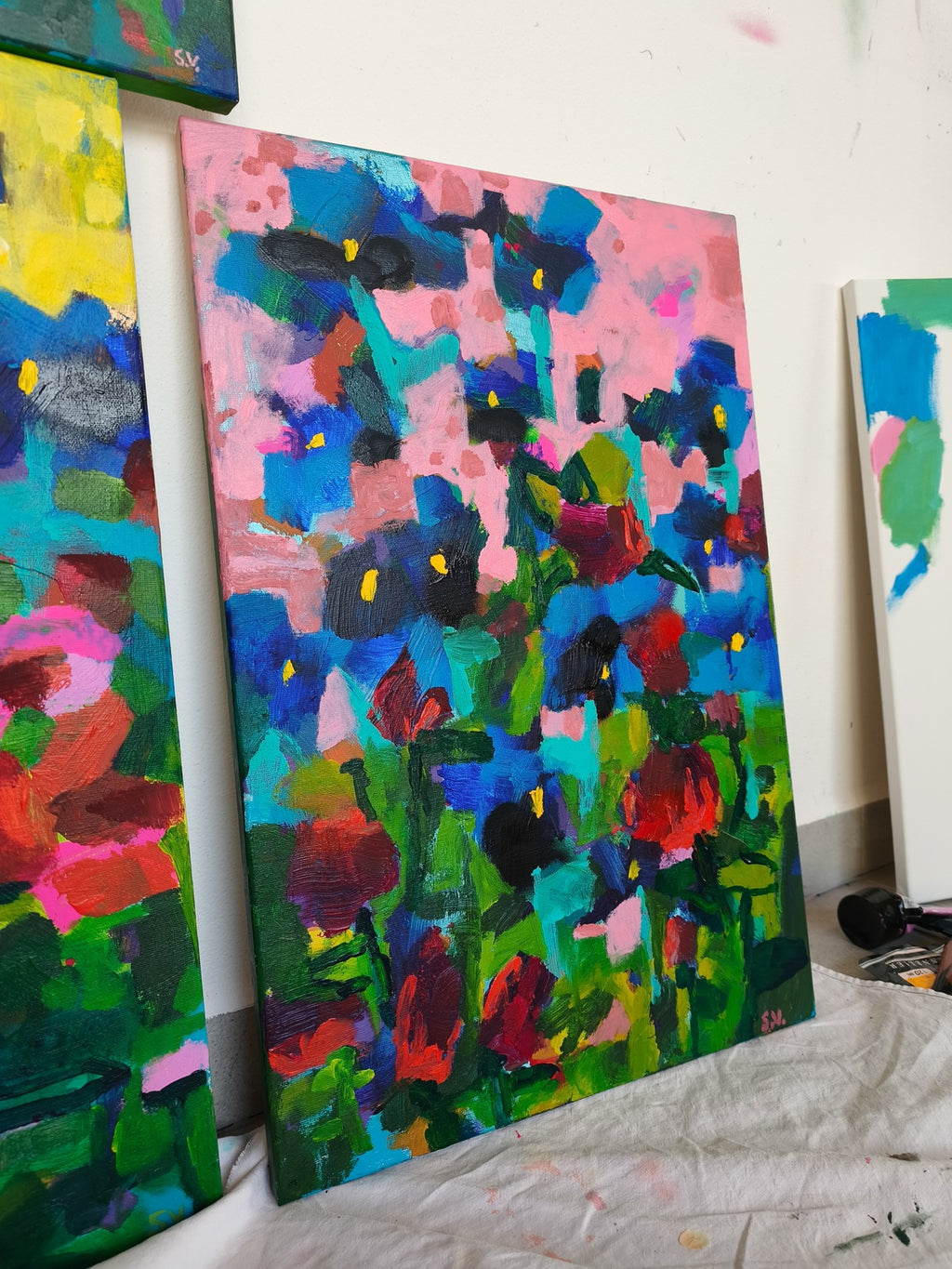 Small abstract floral painting in modern interior, blue and pink wall art for living room or bedroom decor
