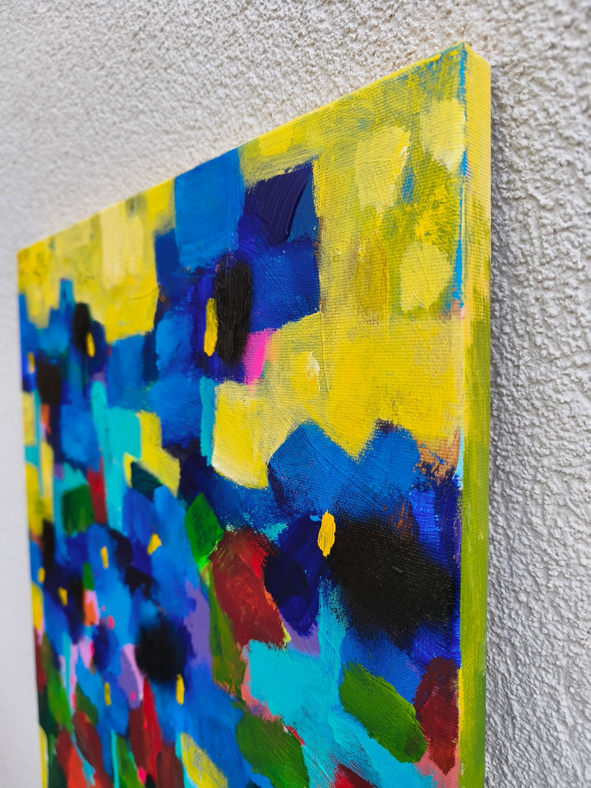 Small abstract floral painting detail with ultramarine iris flowers, red blooms and yellow sky with small stars